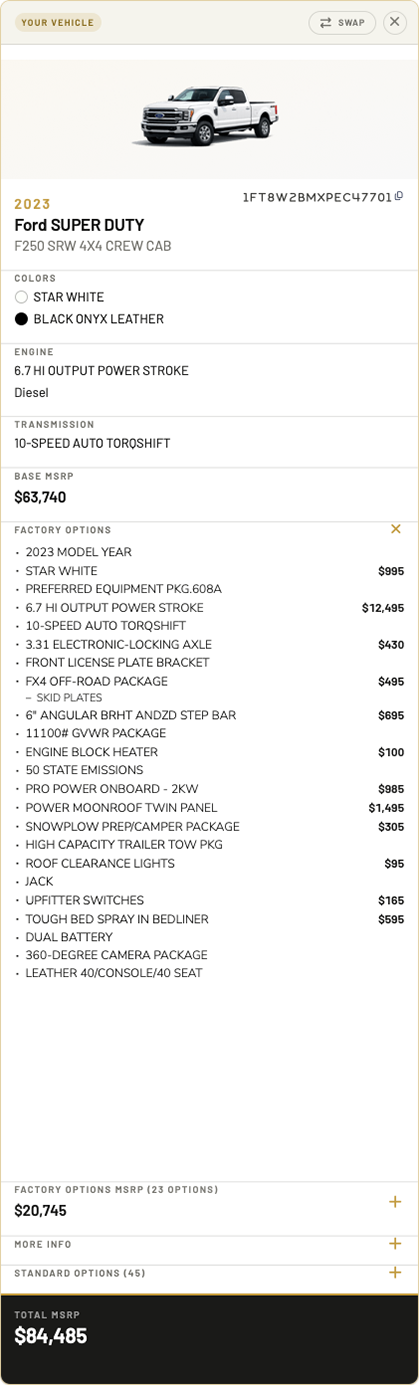 Decoded specifications for the first vehicle: colors, engine, transmission, MSRP, and factory options